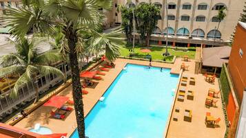 Outdoor pool, open 6:00 AM to 6:00 PM, pool umbrellas, sun loungers