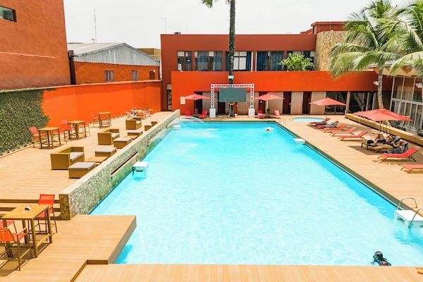 Outdoor pool, open 6:00 AM to 6:00 PM, pool umbrellas, sun loungers