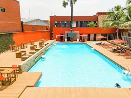Outdoor pool, open 6:00 AM to 6:00 PM, pool umbrellas, sun loungers