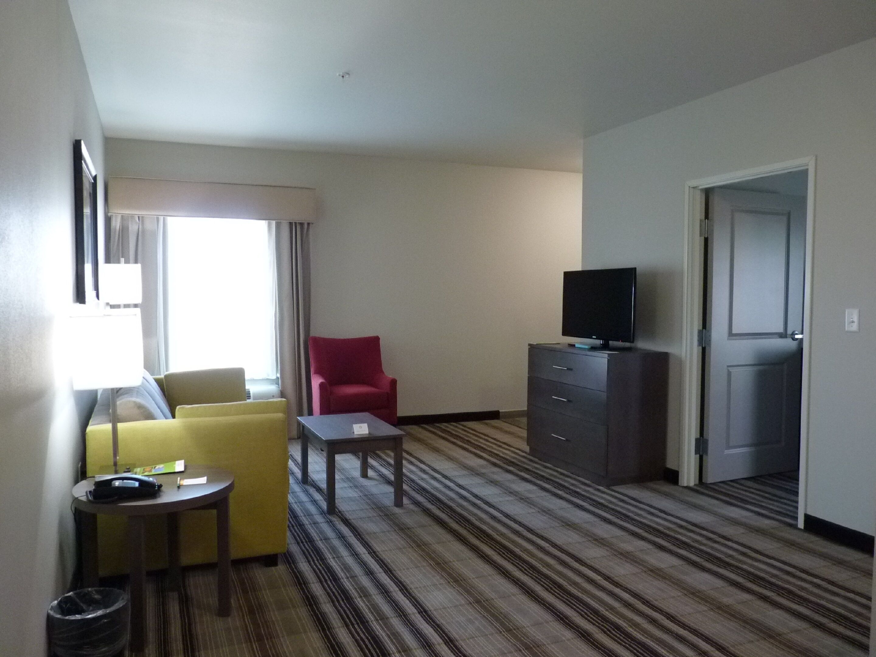 deluxe suite, 1 king bed with sofa bed, accessible (mobility accessible) | premium bedding, desk, soundproofing, iron/ironing board