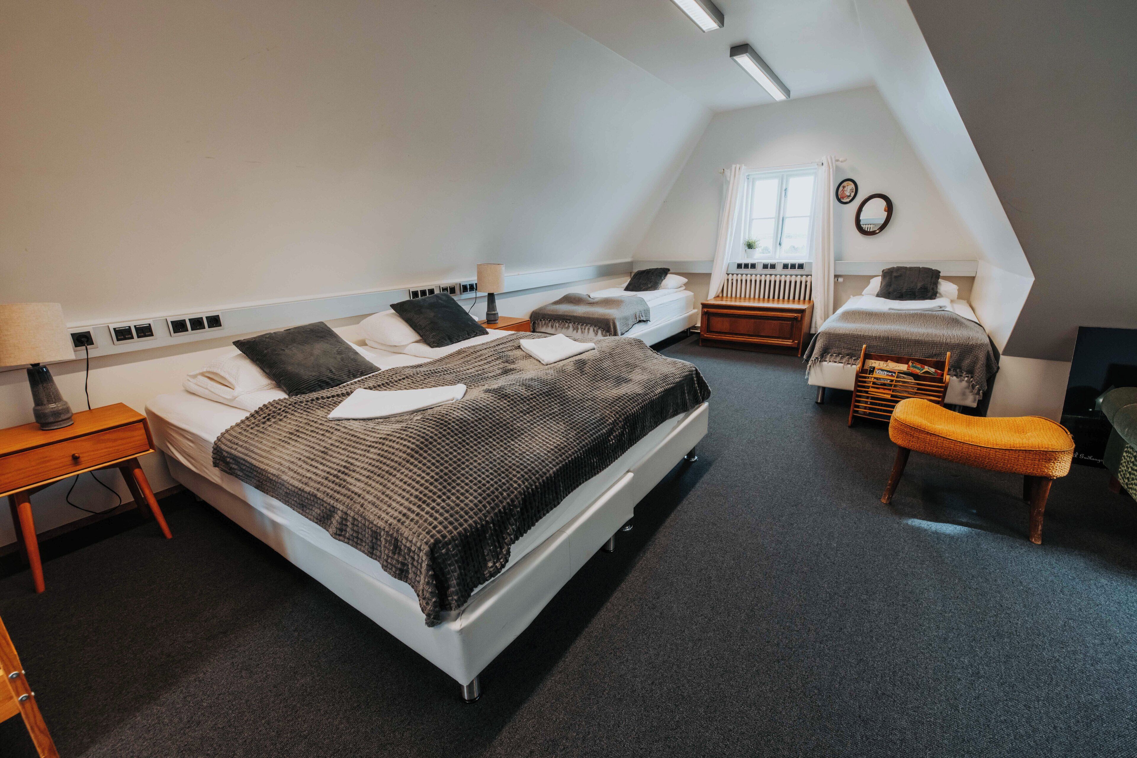 family room, shared bathroom | premium bedding, individually decorated, individually furnished