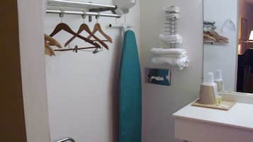 Bathtub, hair dryer, towels