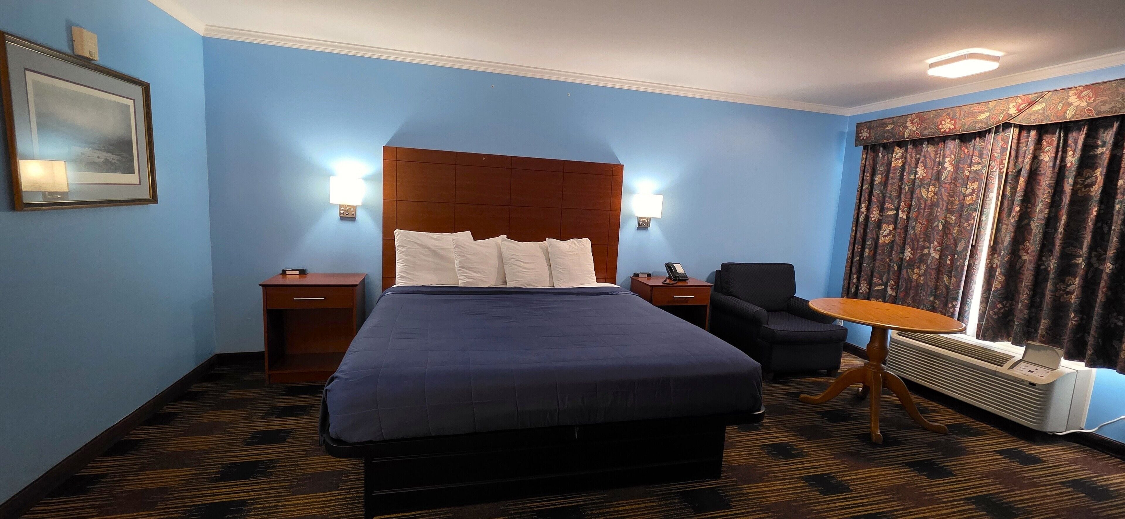 Quarto luxo, 1 cama King | Escrivaninha, ferros/tábuas de passar roupa, berços (sobretaxa)