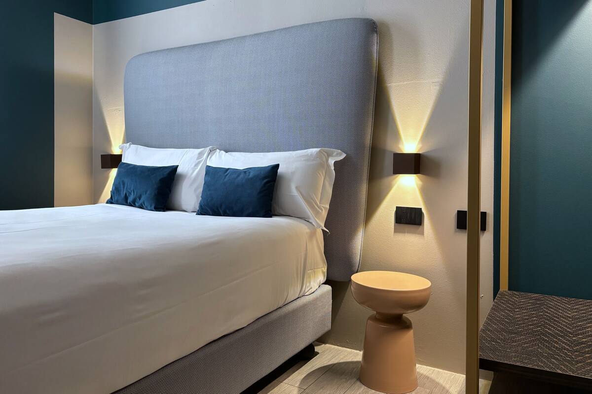 Premium bedding, down duvets, in-room safe, desk