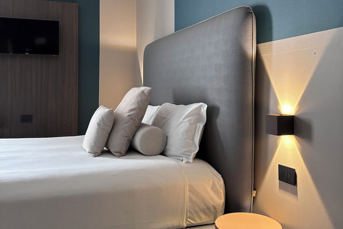 Premium bedding, down duvets, in-room safe, desk