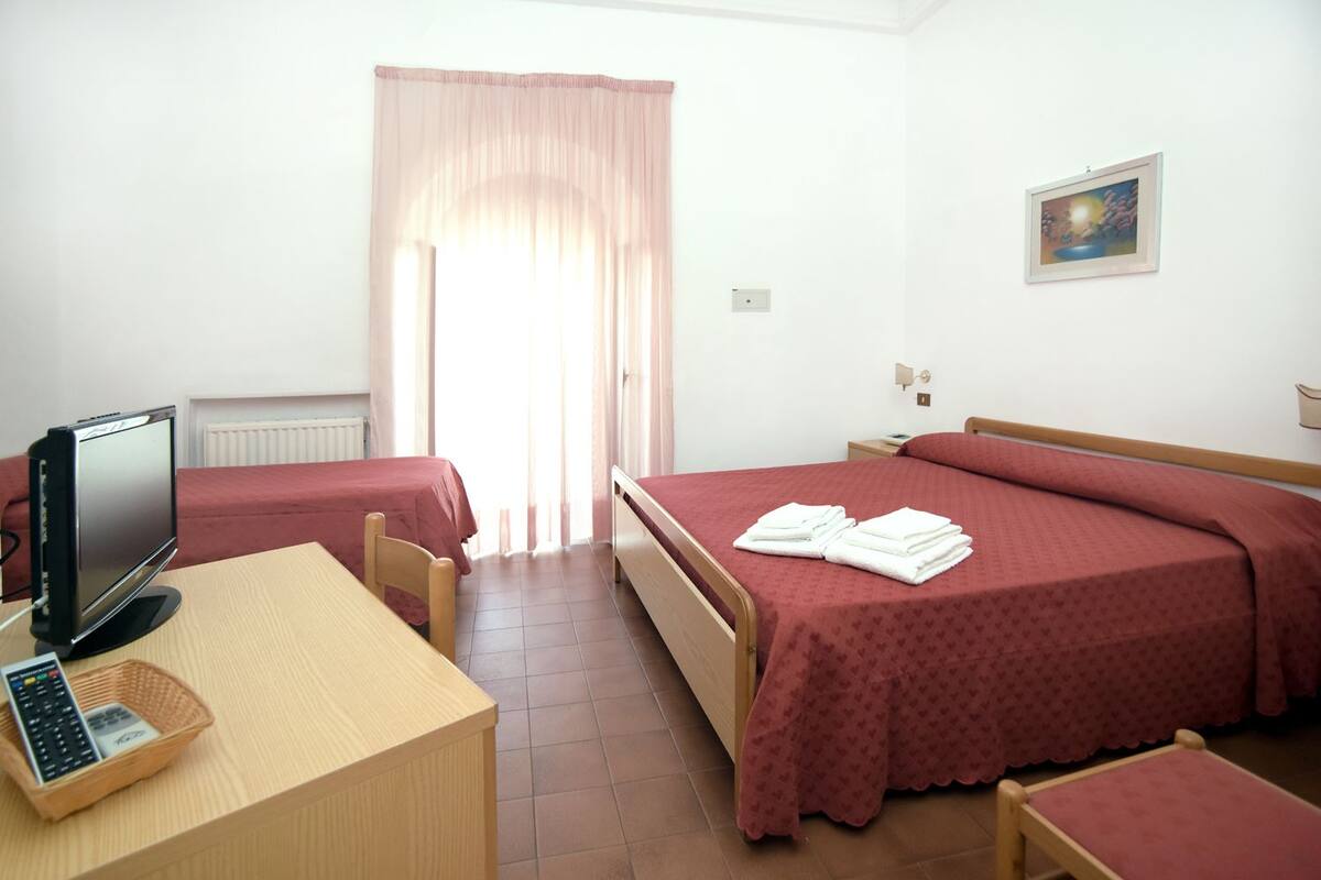 Economy Triple Room, 1 Bedroom, Ensuite | Premium bedding, in-room safe, desk, blackout drapes