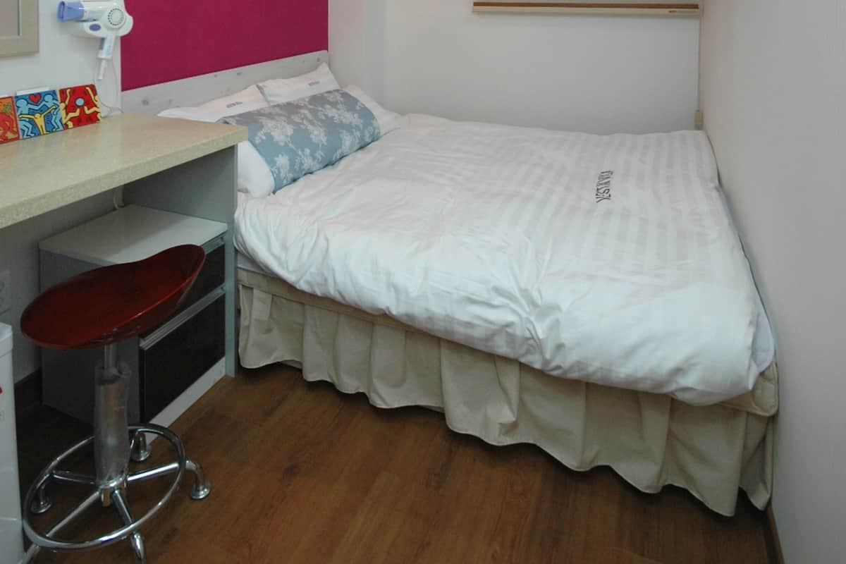 Habitación doble estándar | Cortinas blackout, camas extra y wifi gratis