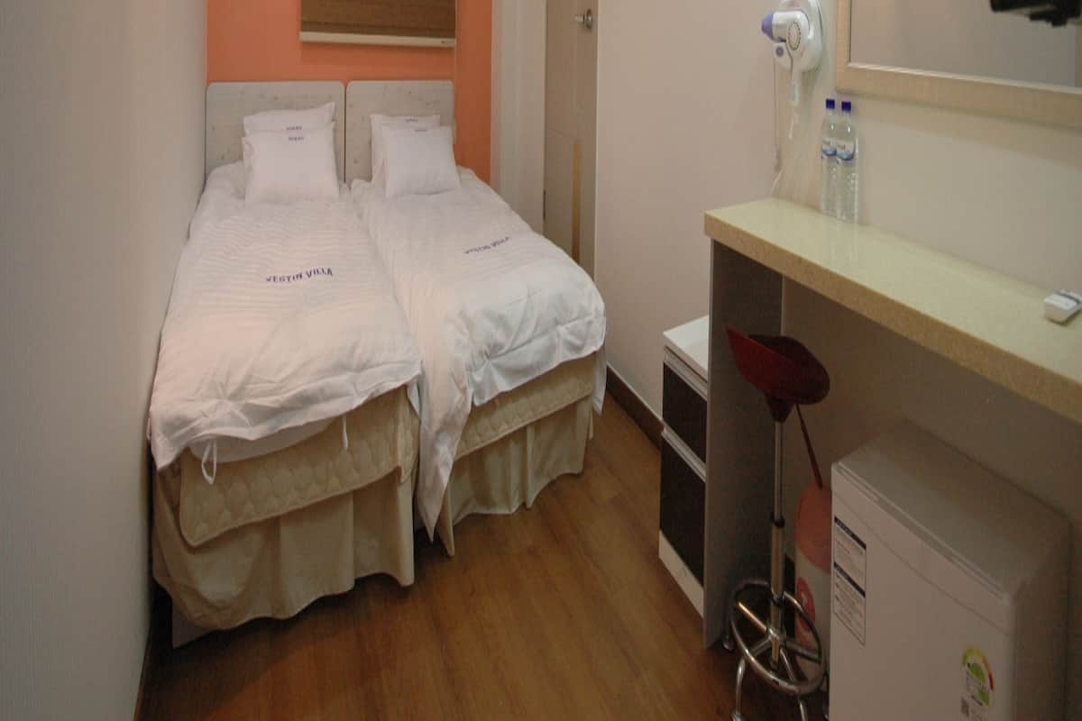 Blackout curtains, rollaway beds, free WiFi