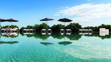 Seasonal outdoor pool, pool umbrellas, sun loungers