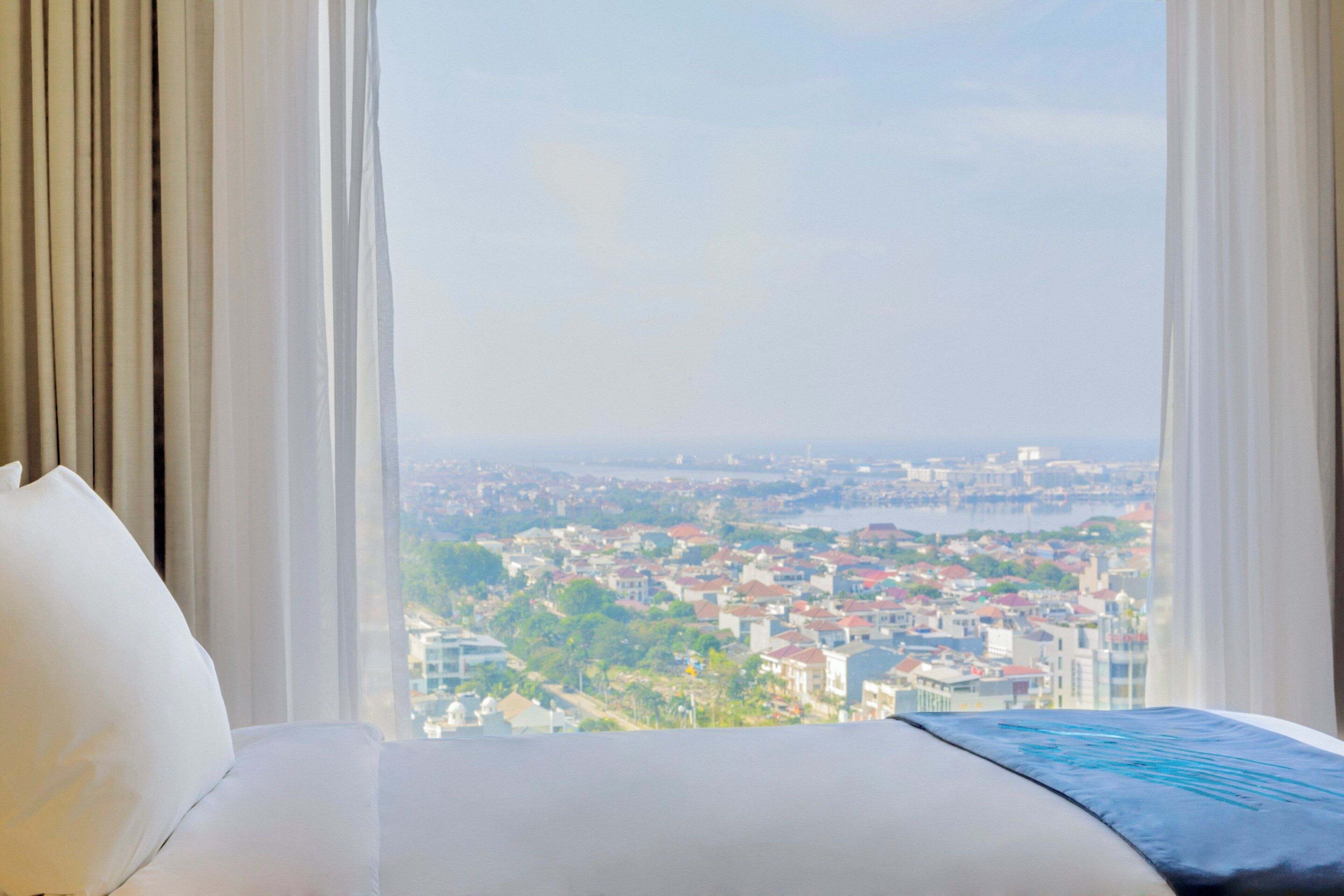 Premium bedding, down duvets, pillow-top beds, in-room safe