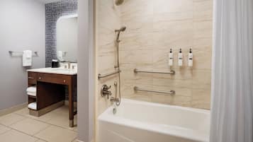 Suite, 1 King Bed, Accessible (Hearing) | Bathroom | Combined shower/tub, designer toiletries, hair dryer, towels