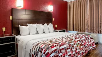 Desk, laptop workspace, blackout drapes, iron/ironing board