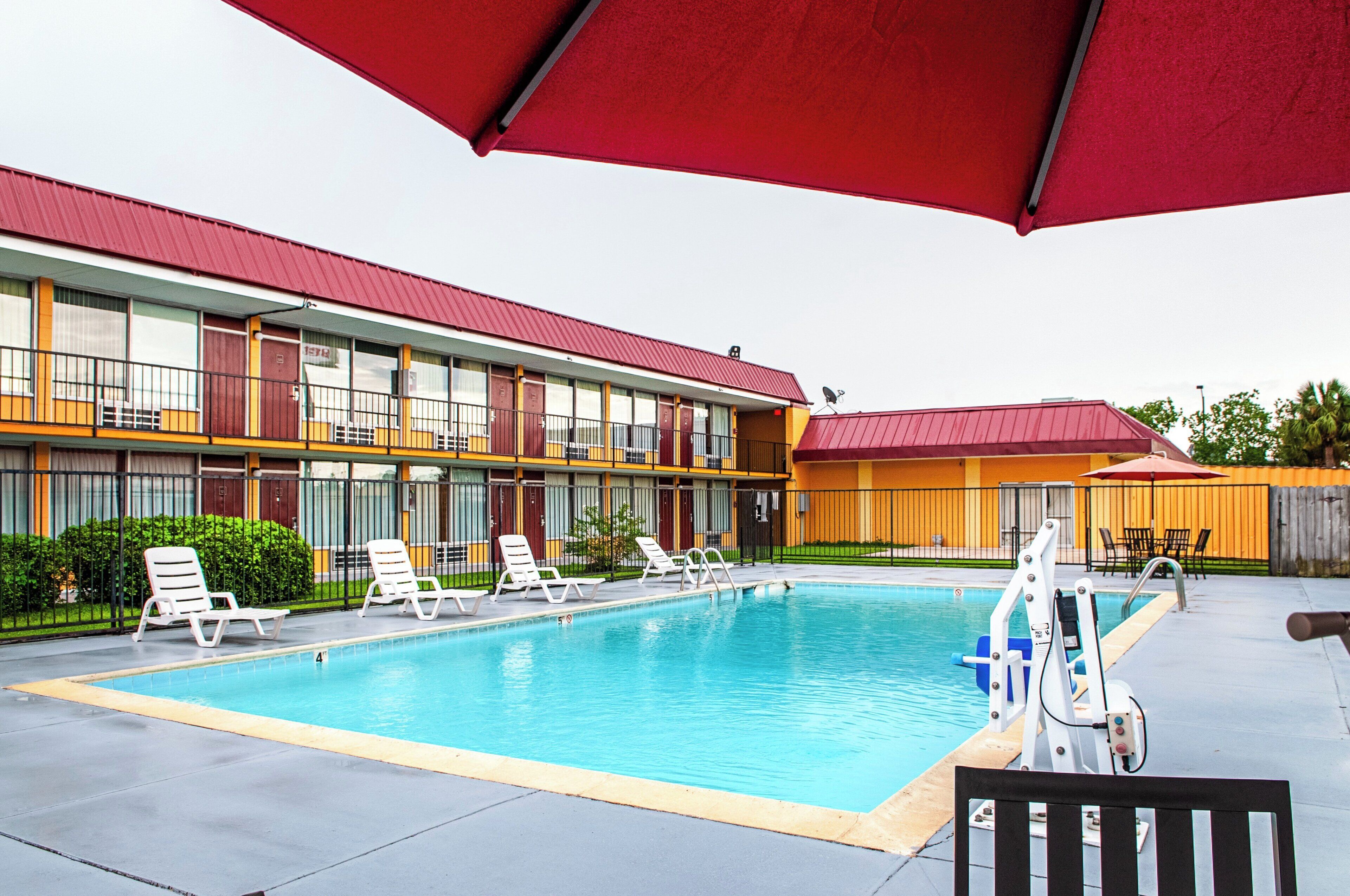 Seasonal outdoor pool, open 10:00 AM to 7:00 PM, pool umbrellas