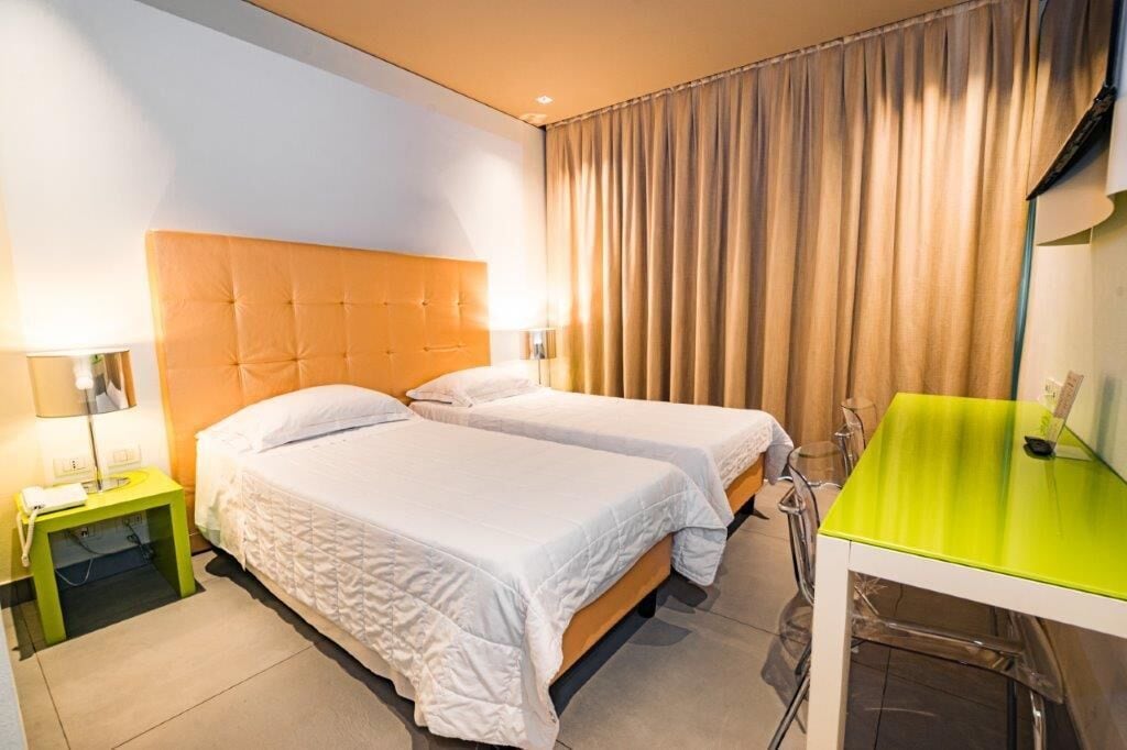 Standard Twin Room | Down comforters, minibar, in-room safe, desk