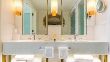 Designer toiletries, hair dryer, bathrobes, slippers