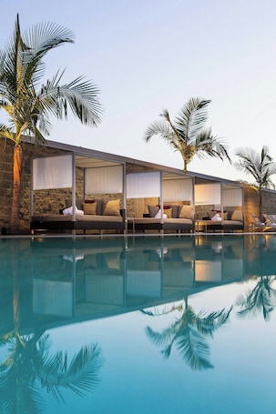 Outdoor pool, free cabanas, pool umbrellas