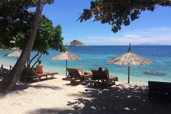 Private beach, sun-loungers, beach massages, scuba diving