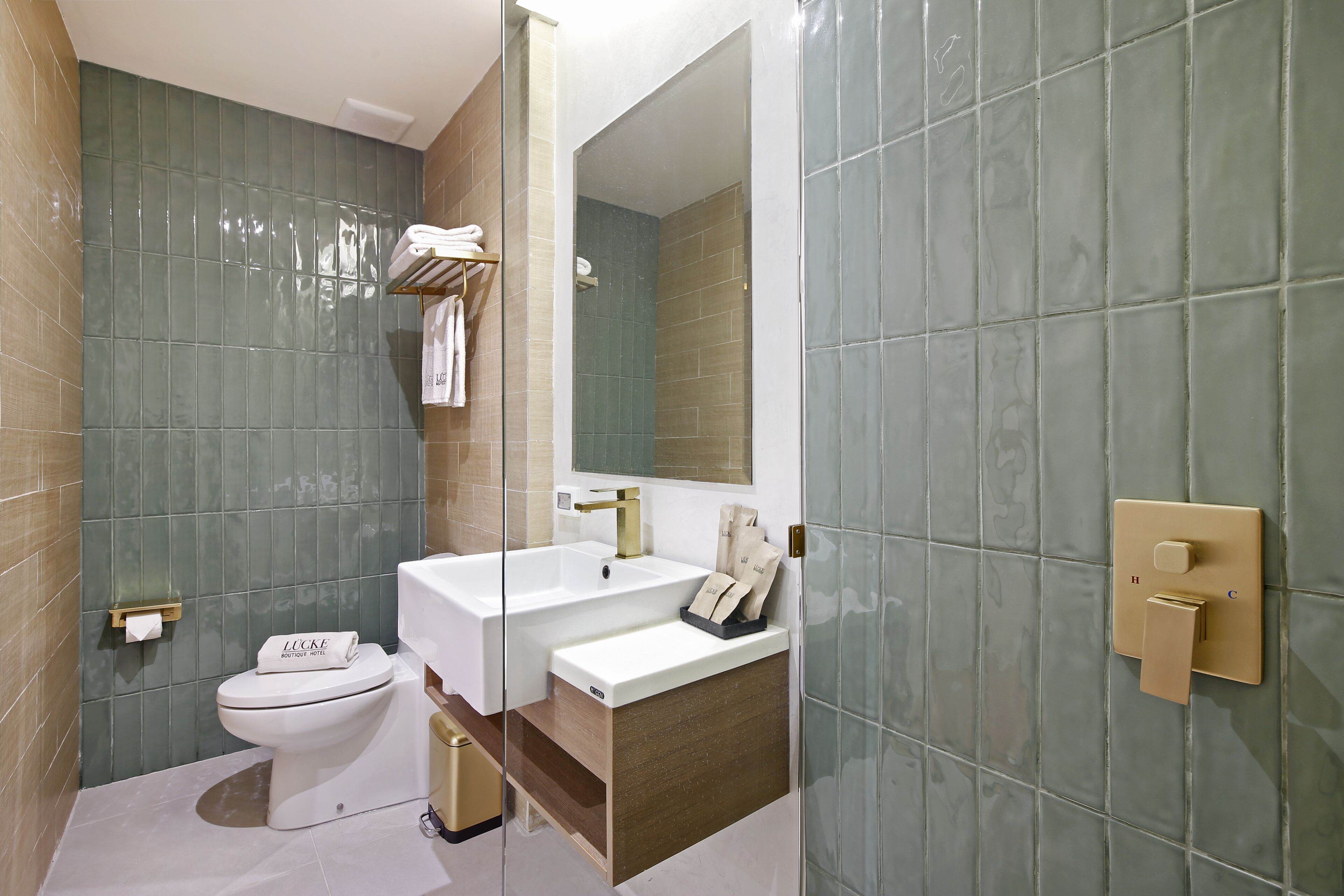 deluxe double room, 1 king bed, terrace, sea view | bathroom | shower, rainfall showerhead, designer toiletries, hair dryer