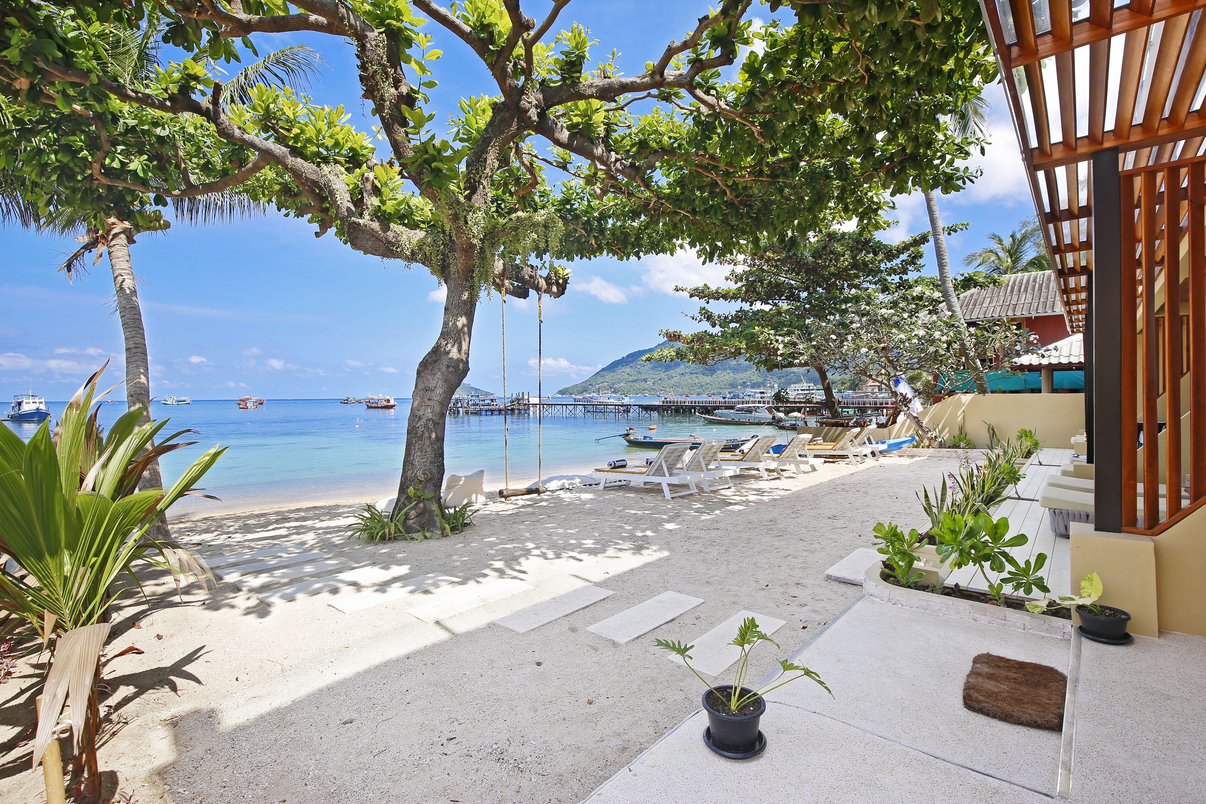 On the beach, sun-loungers, beach towels, scuba diving