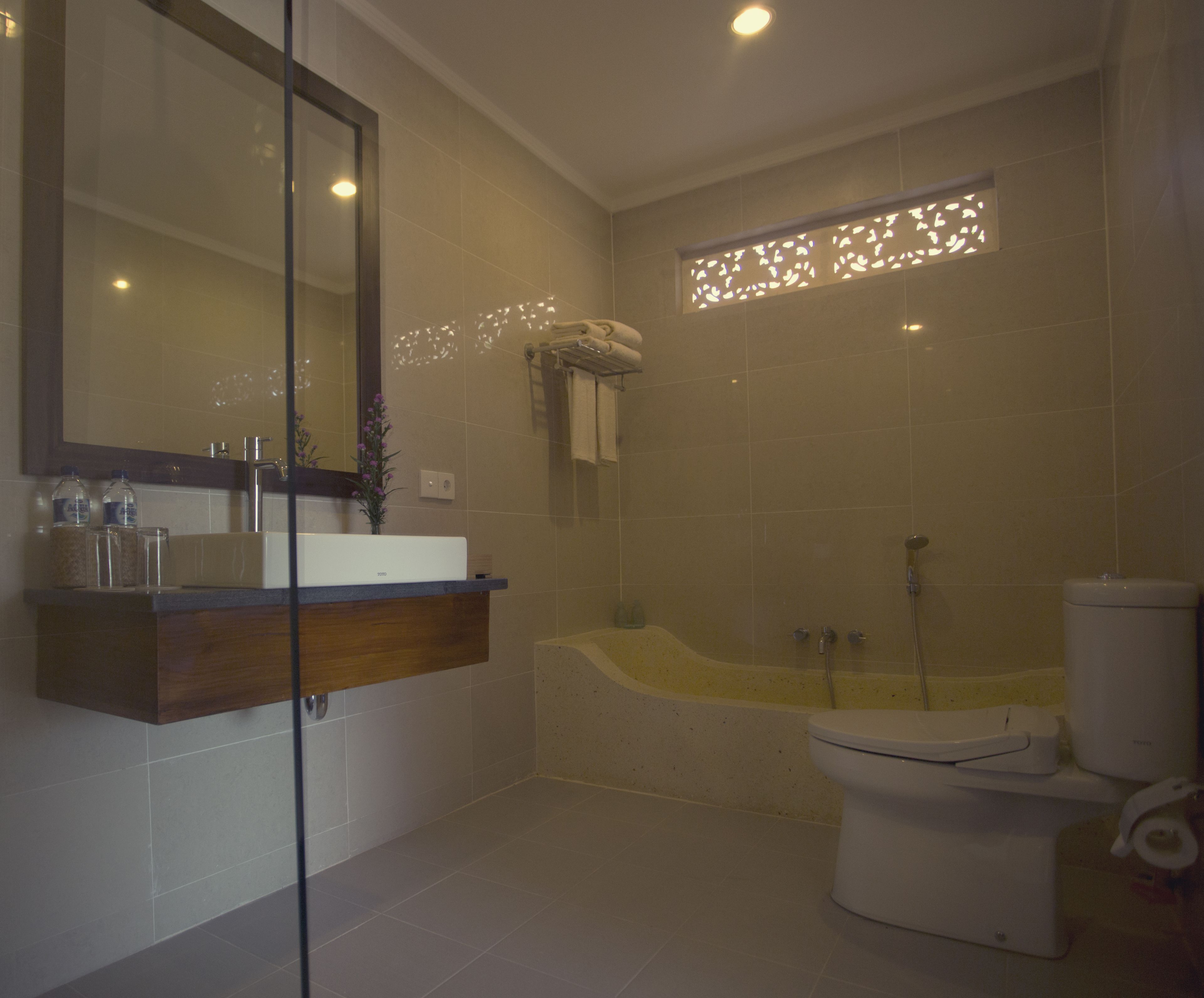 combined shower/bathtub, free toiletries, hair dryer, bathrobes