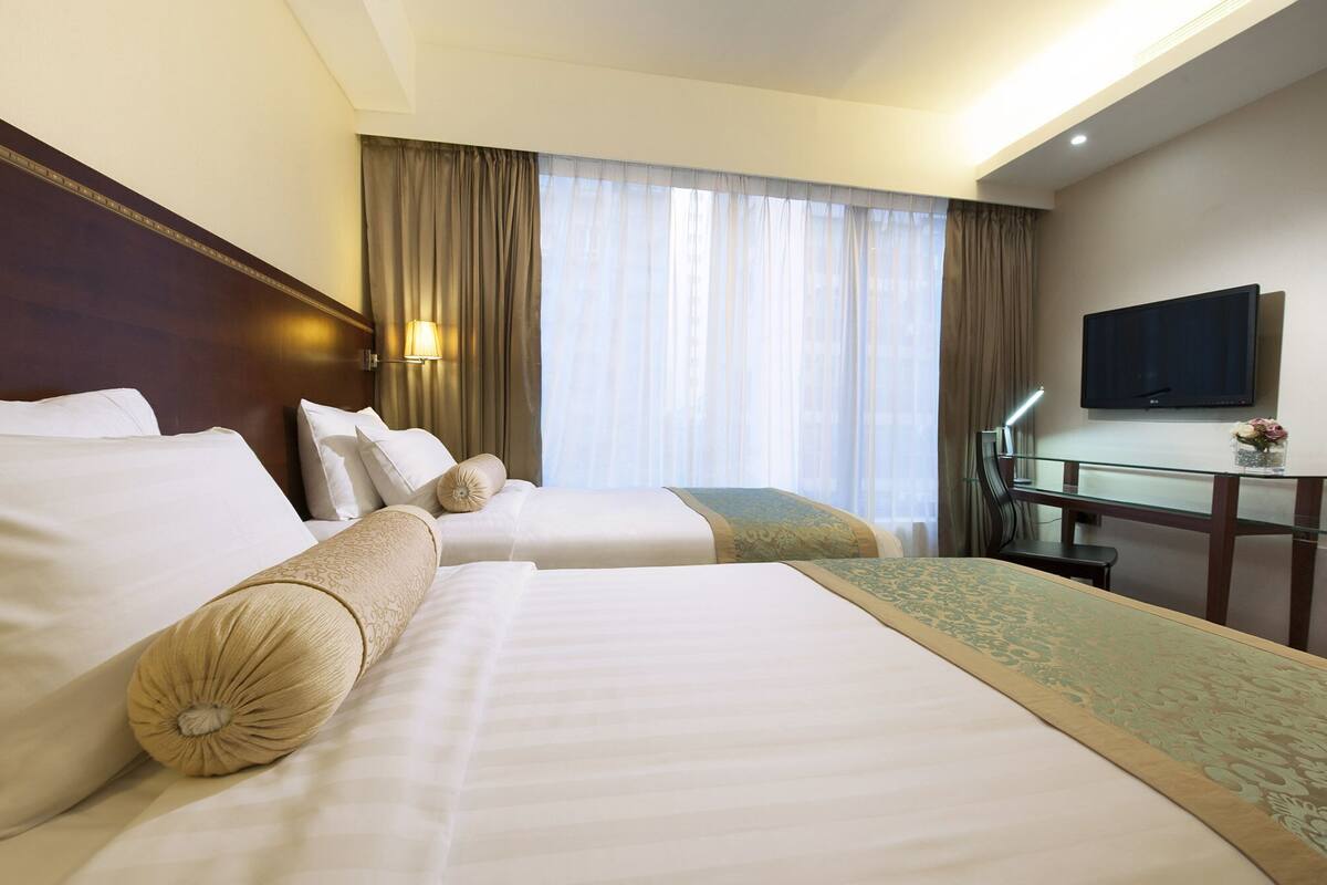 In-room safe, desk, blackout curtains, iron/ironing board (on request)