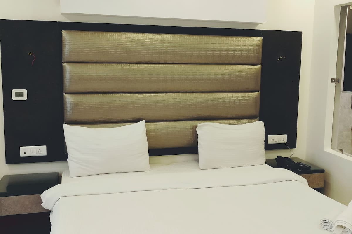 Rom – executive | Sengetøy av topp kvalitet, minibar, safe på rommet og skrivebord