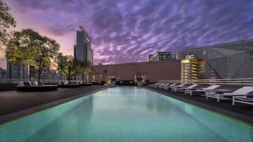 Outdoor pool, pool umbrellas, sun loungers