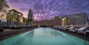 Outdoor pool, pool umbrellas, sun loungers