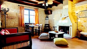 32-inch flat-screen TV with satellite channels, TV, DVD player