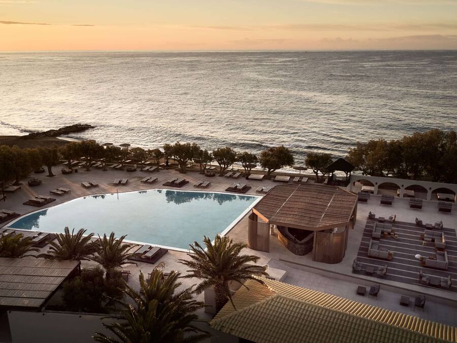 2 outdoor pools, open 10:00 AM to 6:30 PM, pool umbrellas, pool loungers