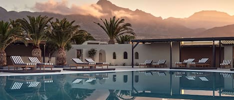 2 outdoor pools, open 10:00 AM to 6:30 PM, pool umbrellas, sun loungers