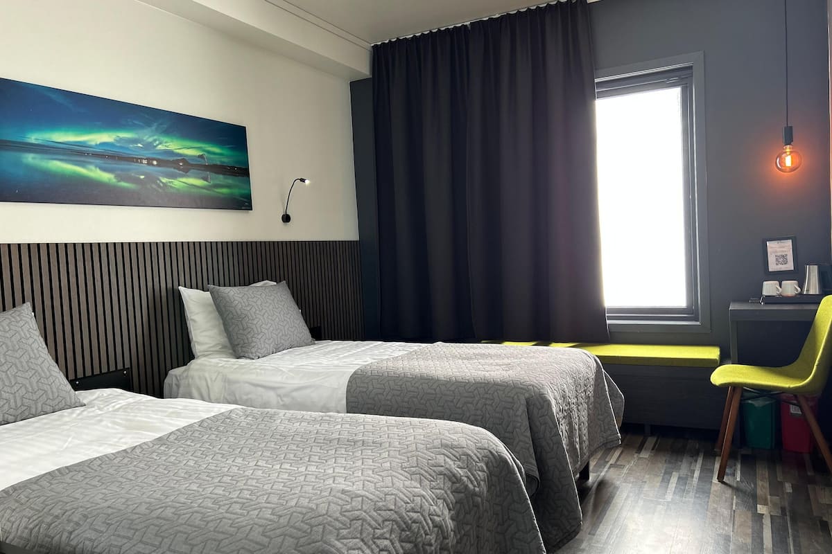 desk, blackout curtains, soundproofing, iron/ironing board