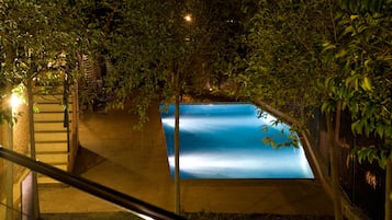 Seasonal outdoor pool, pool umbrellas, pool loungers