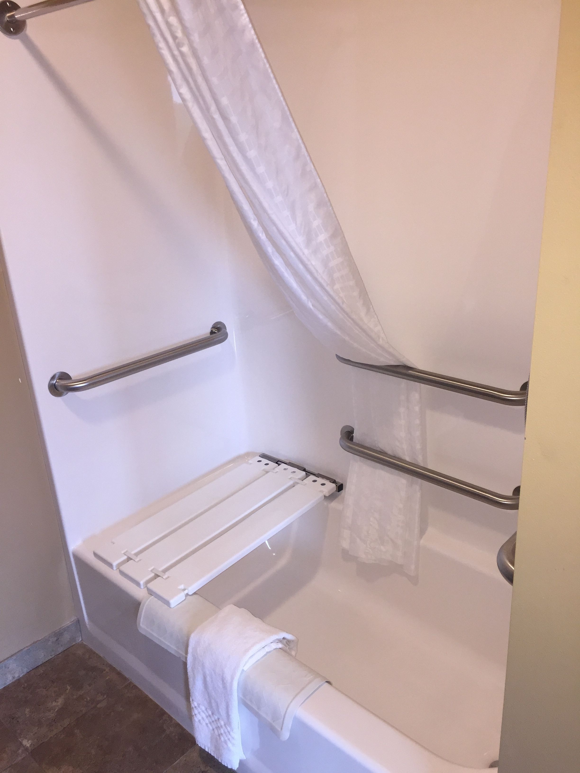 room, 1 king bed, non smoking | bathroom | combined shower/bathtub, rainfall showerhead, designer toiletries