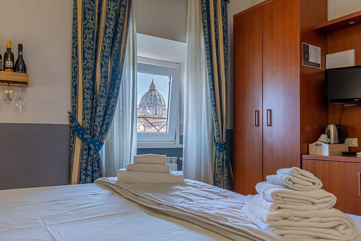 Premium bedding, down duvets, Select Comfort beds, minibar