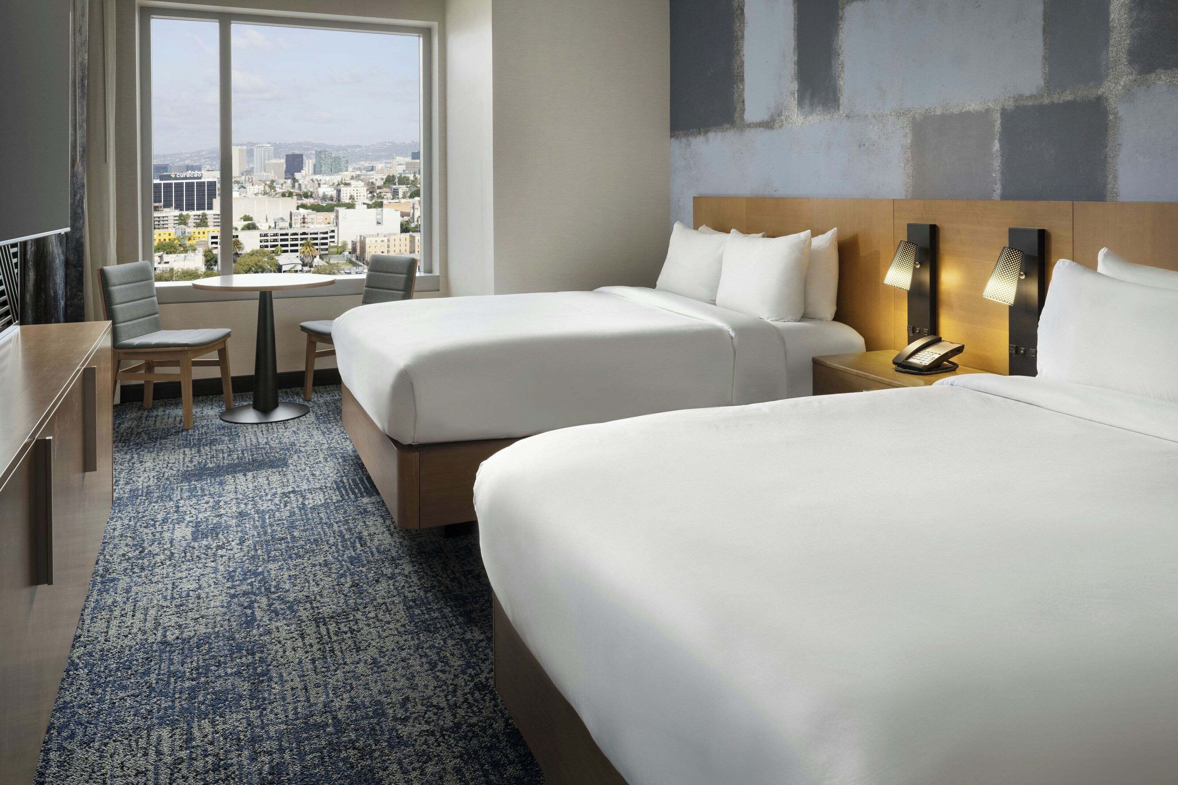 junior suite, multiple beds, non smoking | 1 bedroom, premium bedding, in-room safe, desk