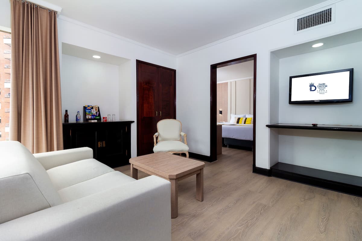 Luxury Suite | Minibar, in-room safe, laptop workspace, iron/ironing board