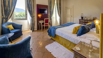 Superior Double or Twin Room | Minibar, in-room safe, blackout curtains, bed sheets