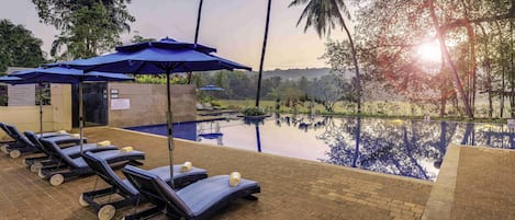 Outdoor pool, open 8 AM to 8 PM, free cabanas, pool umbrellas