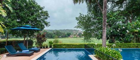 Outdoor pool, open 8 AM to 8 PM, free cabanas, pool umbrellas