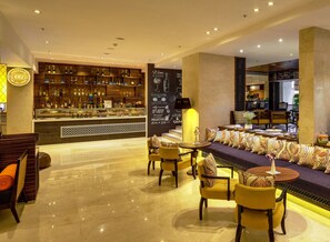 2 bars/lounges, swim-up bar, poolside bar