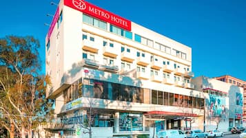Stylish hotel with modern architecture and large windows.