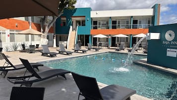 Outdoor pool, open 9:00 AM to 9:00 PM, sun loungers