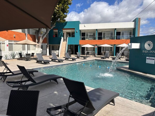 Outdoor pool, open 9:00 AM to 9:00 PM, sun loungers