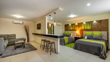 Junior Suite | 1 bedroom, laptop workspace, blackout curtains, iron/ironing board
