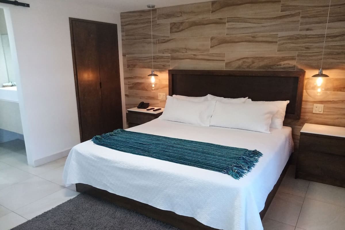 Blackout curtains, iron/ironing board, free WiFi, bed sheets