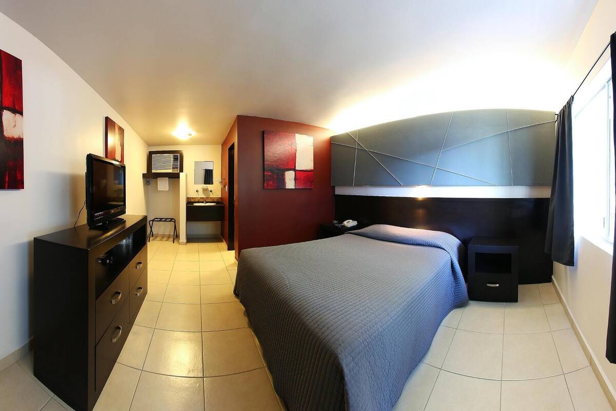 Blackout curtains, iron/ironing board, free WiFi, bed sheets