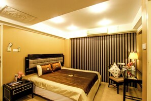 Ropa de cama hipoalergénica, minibar, caja fuerte