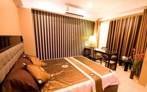 Ropa de cama hipoalergénica, minibar, caja fuerte