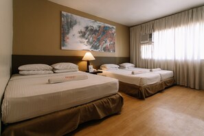Family Room | In-room safe, desk, free WiFi, bed sheets - Dynasty Tourist Inn (Cebu City)